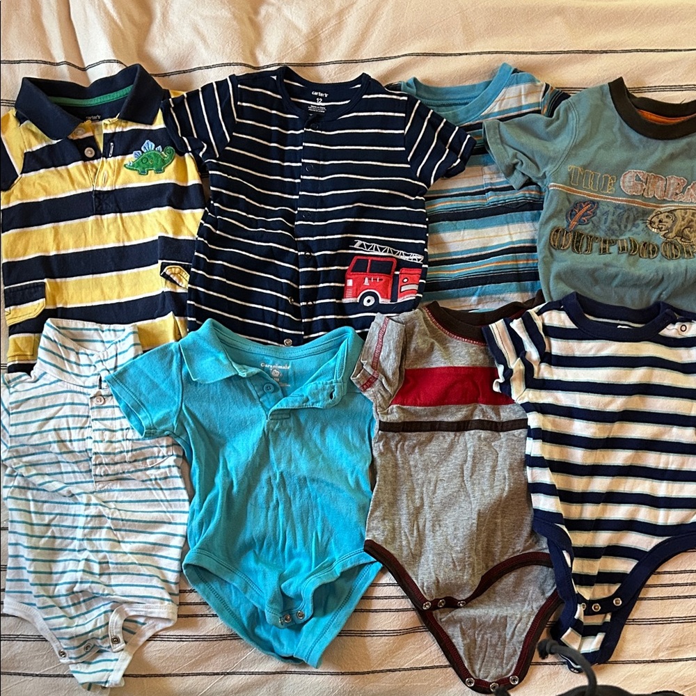 Bundle of 8 boys 6/9-12 onesies.